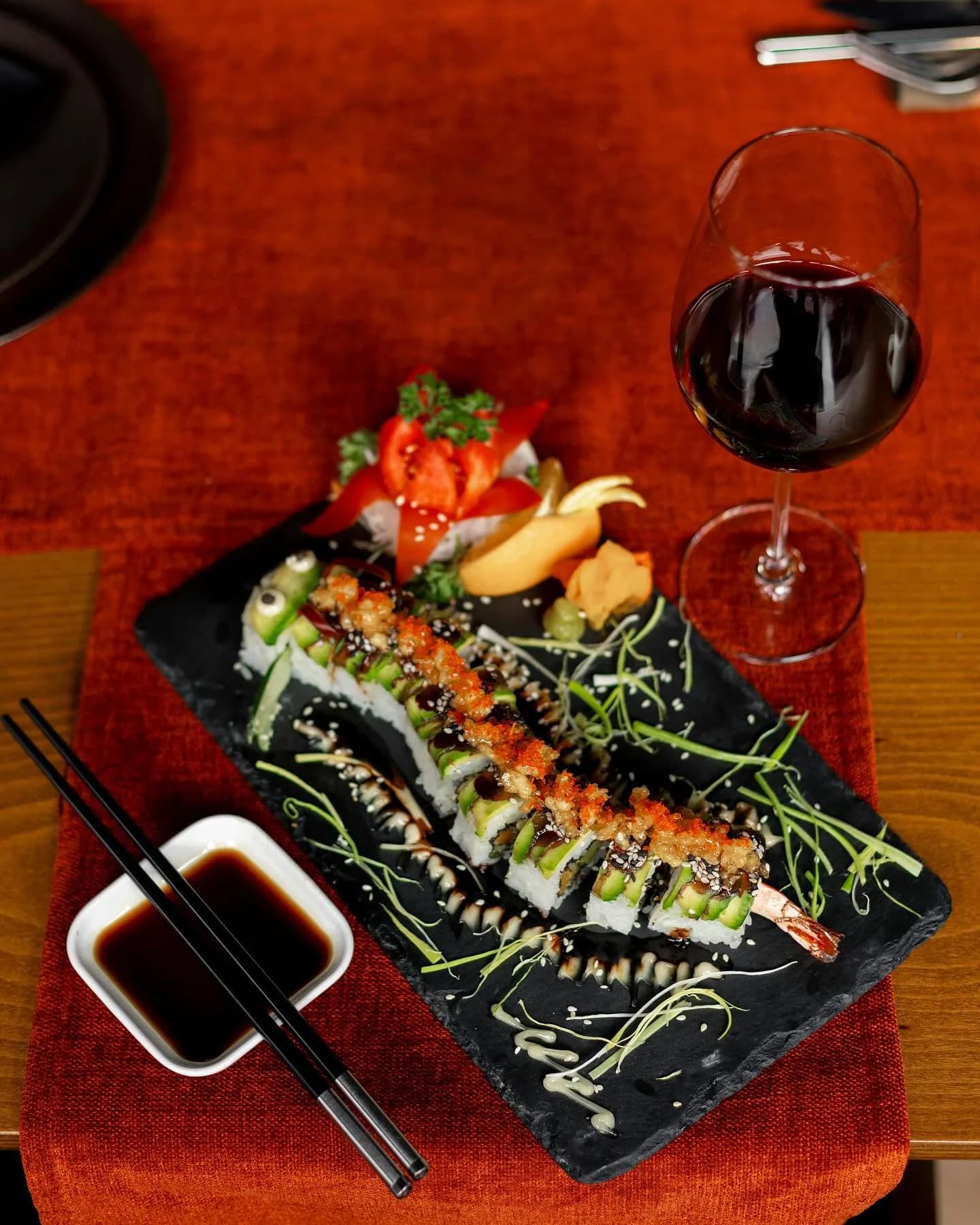 A dragon roll cut to order at Kultura