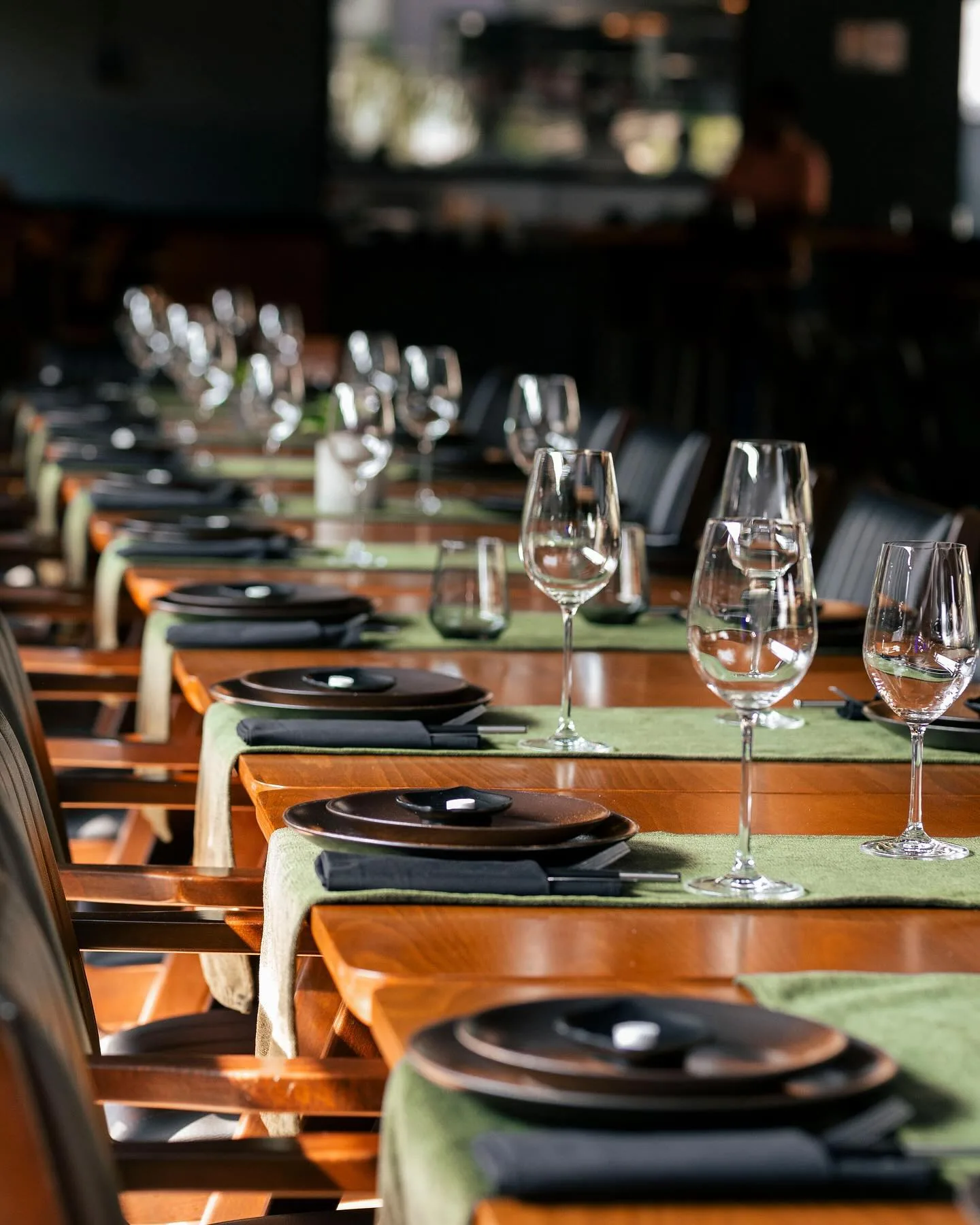 The long table at Kultura set with glassware